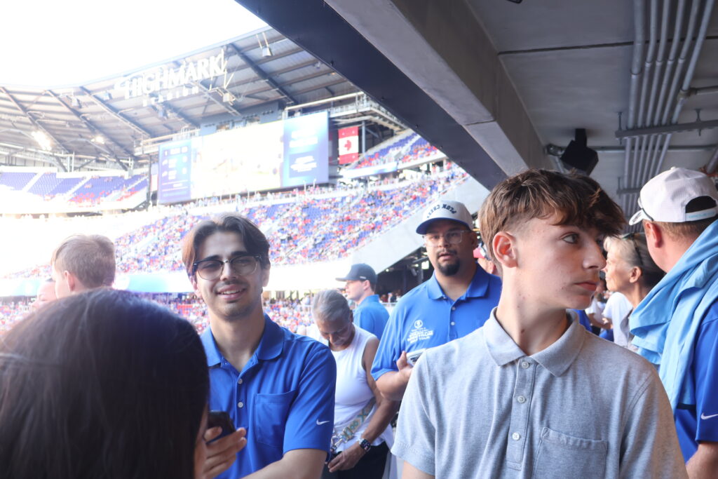 Two young attendees on the concourse during the stadium visit