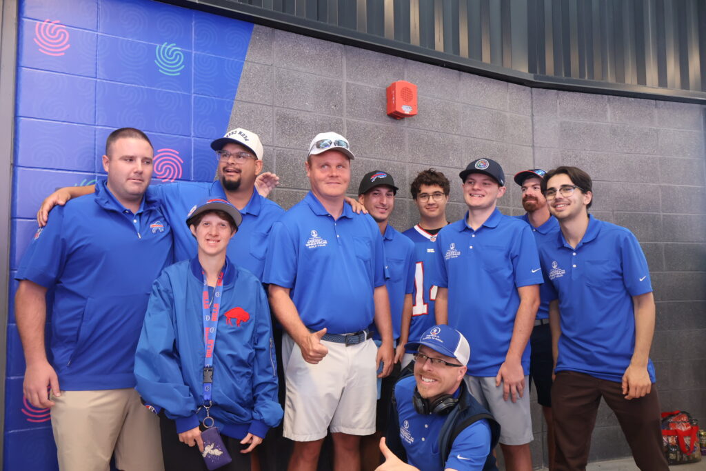 Attendees in Foundation polo shirts gathered outside the sensory room