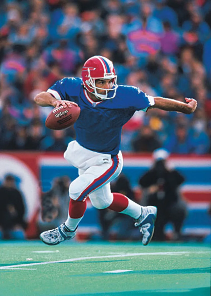 Doug Flutie scrambling out of the pocket with the ball tucked under his arm