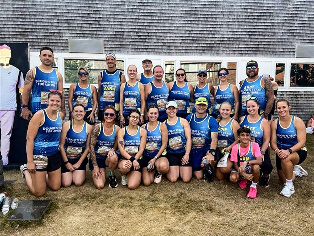 The Dougie's Team for Autism squad gathered for a group photograph after the race